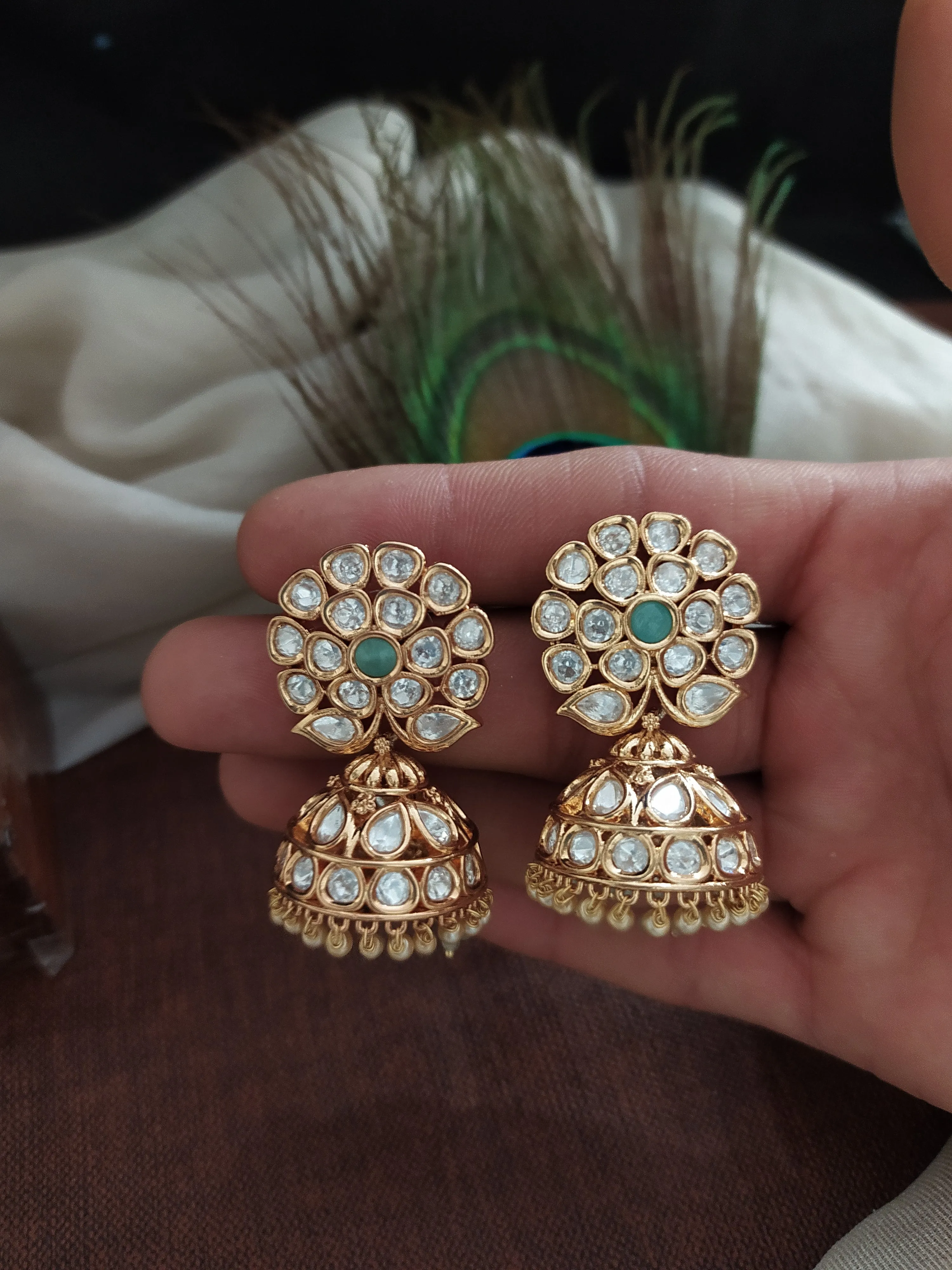 "Kundan Floral Studded Jhumki with Mint Center and Pearl Drops"