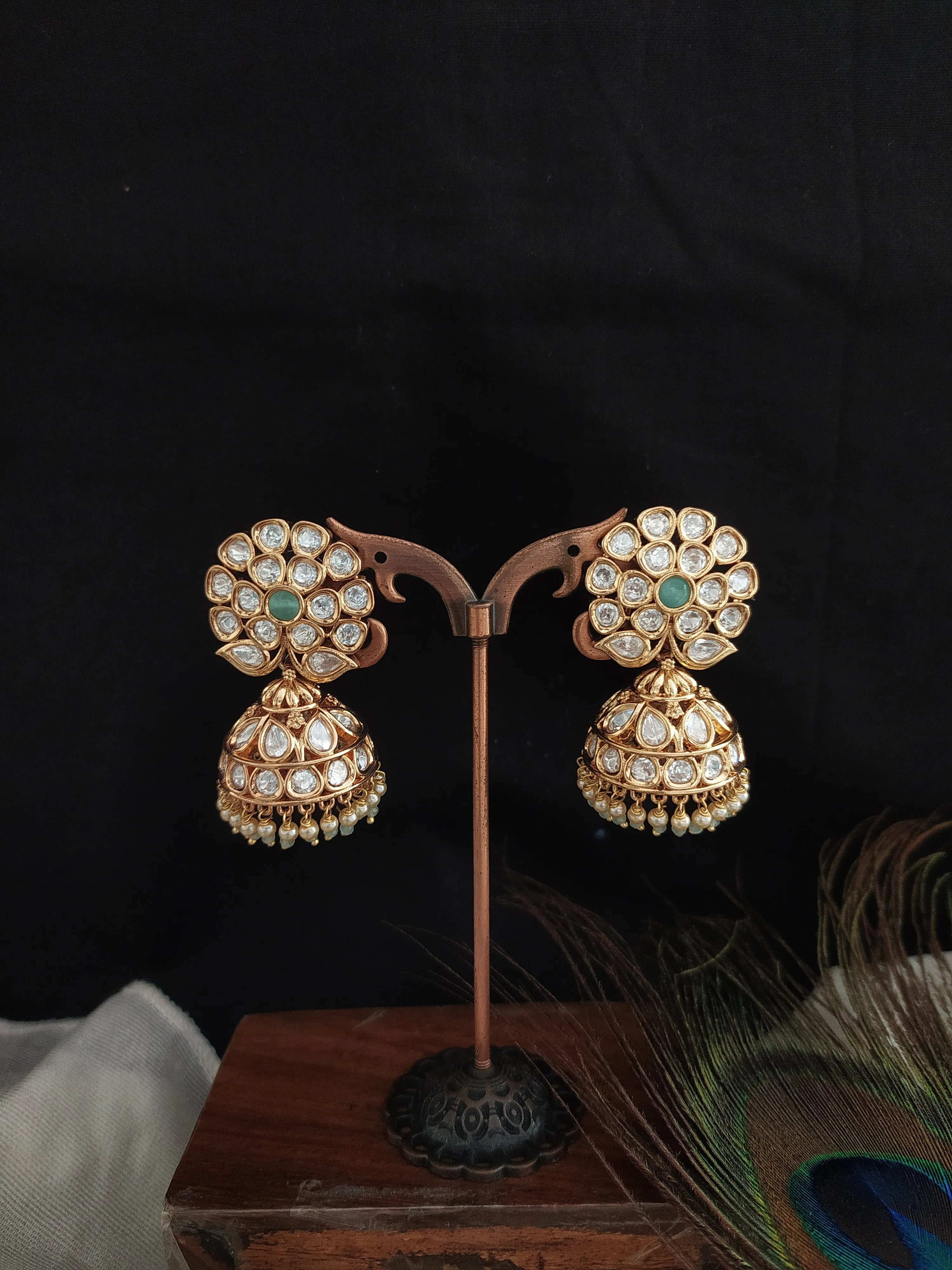 "Kundan Floral Studded Jhumki with Mint Center and Pearl Drops"